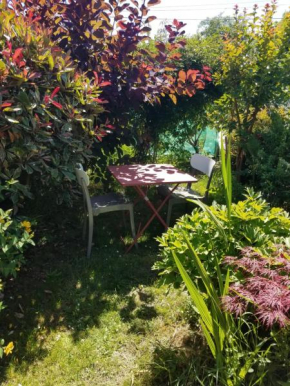 Petit logement dans un écrin de verdure
